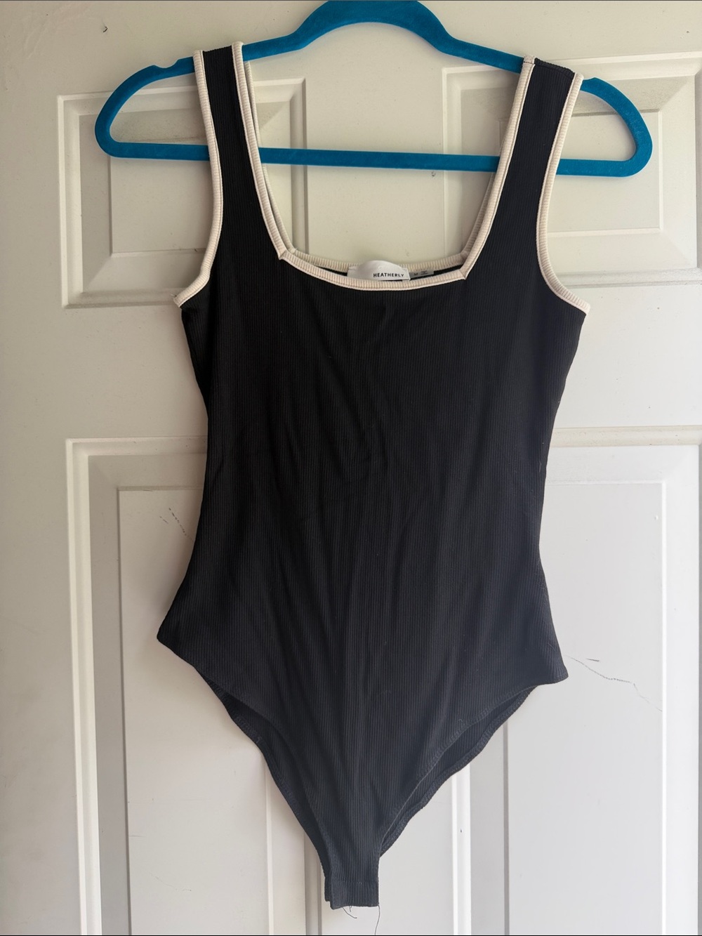 Heatherly Black Ribbed Tank Bodysuit with Cream Trim